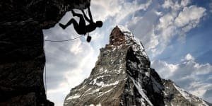 image of person climbing mountain